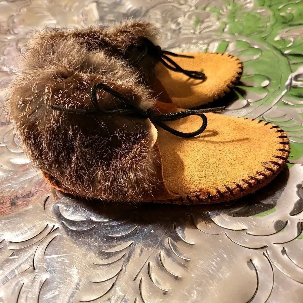 Moccasins,  real leather and real rabbit fur,  has a great insole! Size 8 child